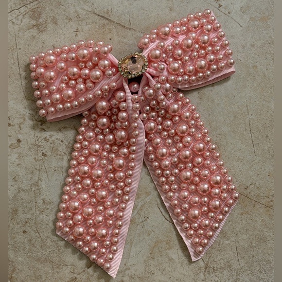 Accessories - Pink pearl bow hair clip with beaded detail and elegant oversized design